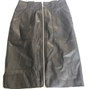 Black faux leather skirt with pockets.